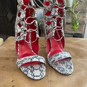 Charles Jourdan snakeskin lace up heels